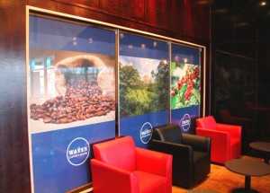 Creating an atmosphere in your business using canvas-printed substrate. These roll-up window blinds add to the visual experience in your business.